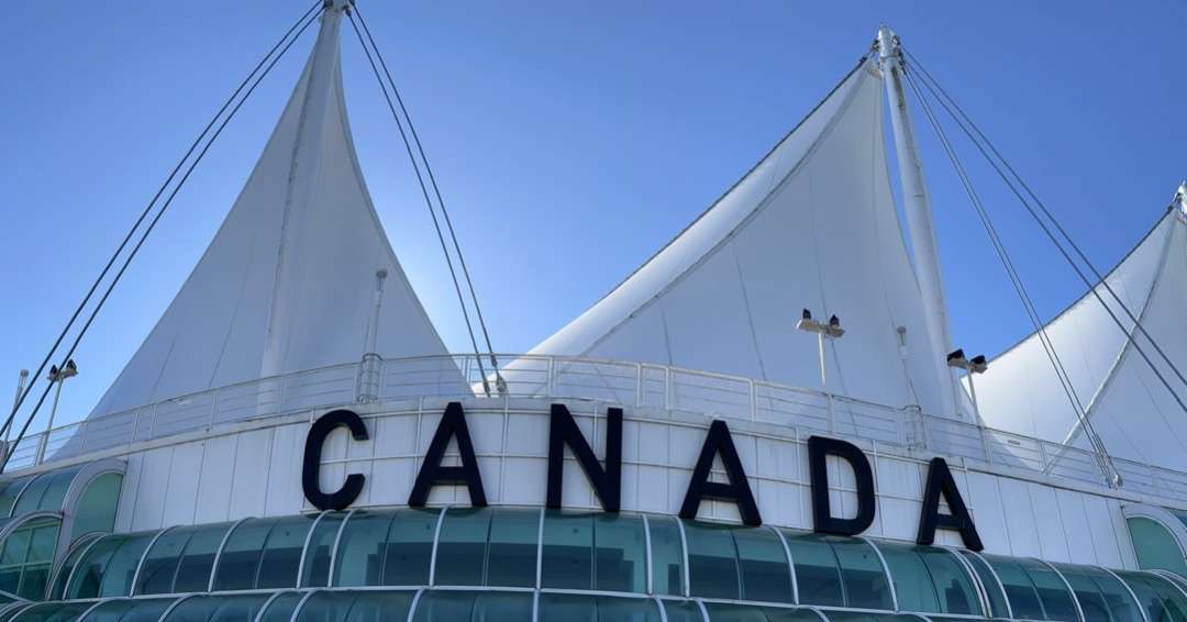 Canada sign with sails behind